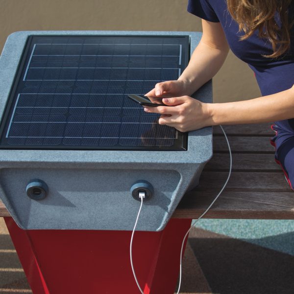 EV Charger 10 woman-charging-mobile-phone-via-usb-outdoors.jpg